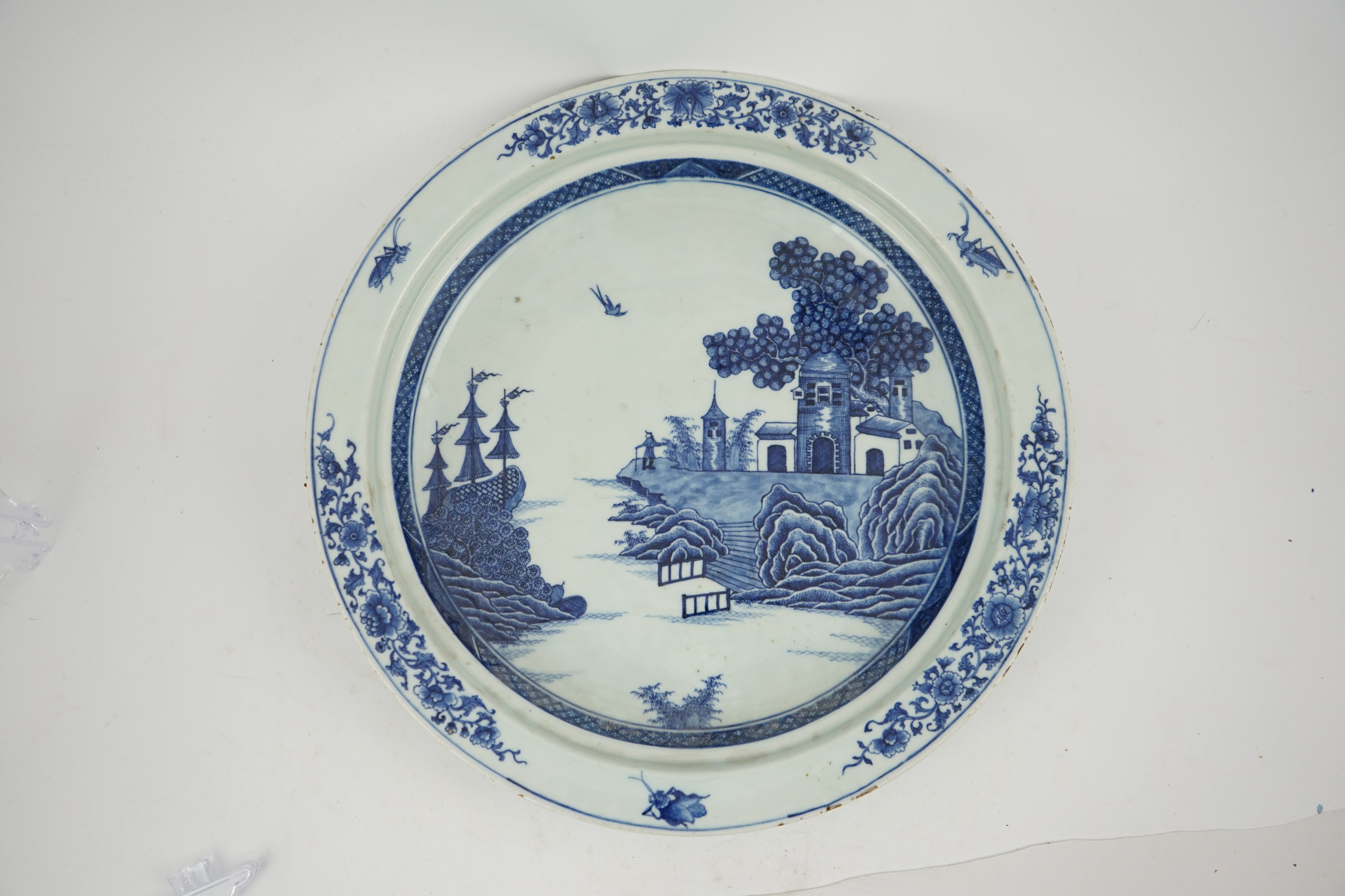 An unusual Chinese European subject blue and white shallow basin, Qianlong period